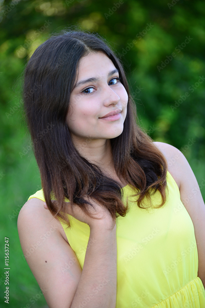 Portrait of teen brunette with long hair Portrait of teen brunette with long hair