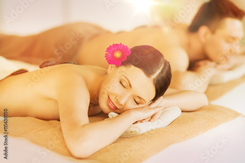 couple in spa with hot stones