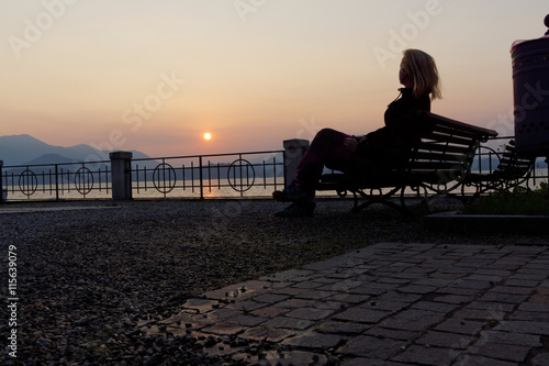 Tourist enjoying the stunning sunup betweeen the mountainridge photo