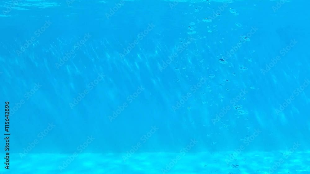 Scissors that is sinking to the bottom of the pool. Scissors that is sinking to the bottom of the pool.