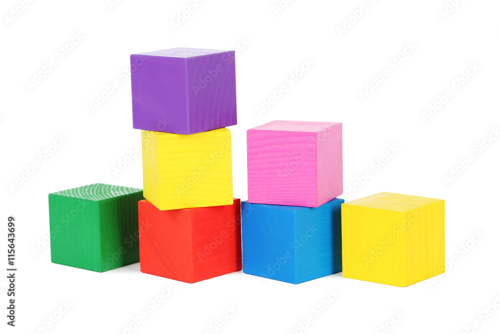 Colorful wooden toy cubes isolated on a white Colorful wooden toy cubes isolated on a white