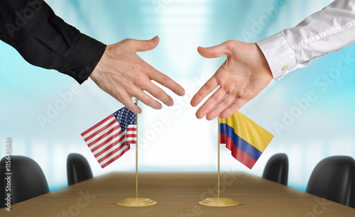 Картината върху платно United States and Colombia diplomats shaking hands to agree deal, part 3D render