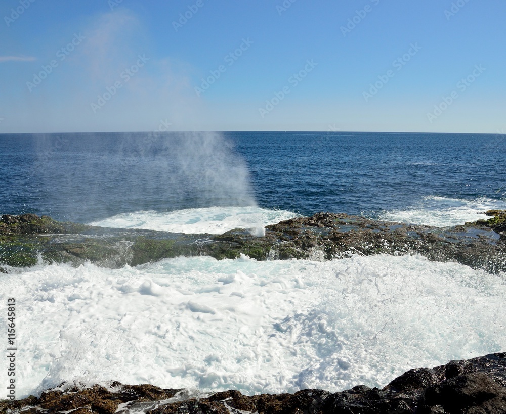Natural pool with water in full effervescence at high tide, coast of Gran canaria, Canary islands Natural pool with water in full effervescence at high tide, coast of Gran canaria, Canary islands