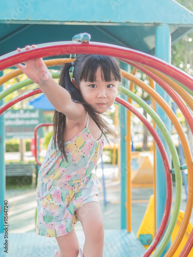 asian baby child playing on playground