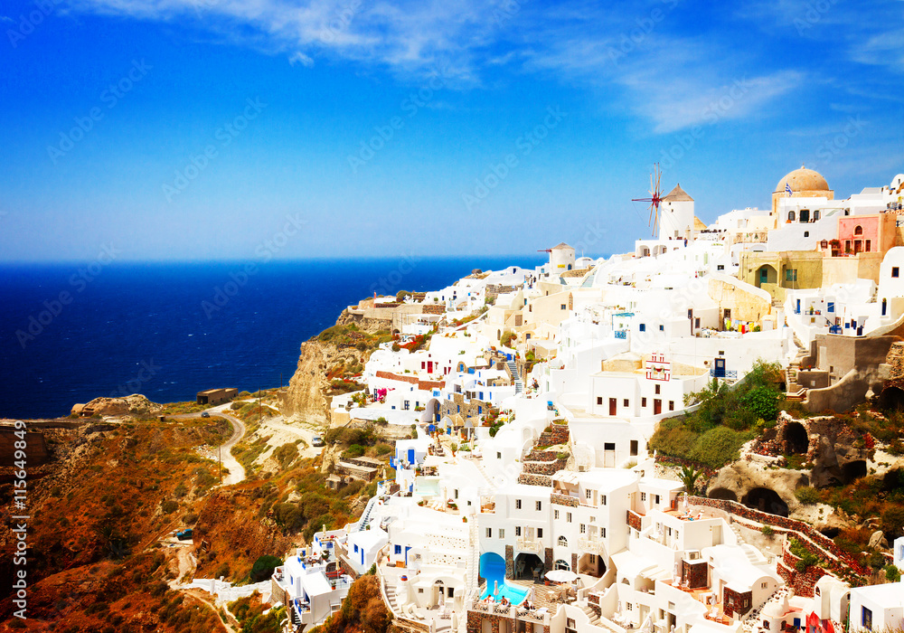 Oia, famous white greek village of Santorini island, Greece, toned
