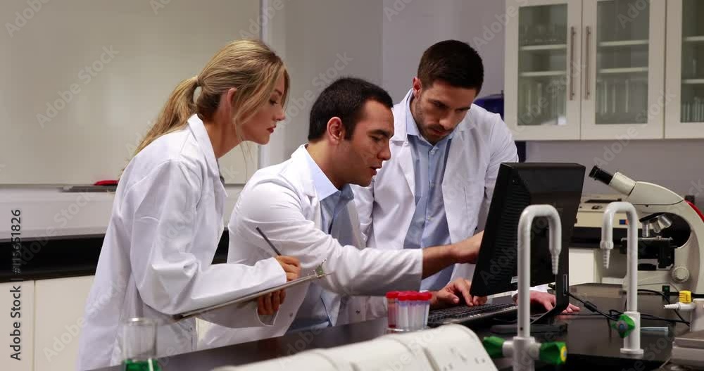 Young scientists working together in the lab in high quality 4k format Young scientists working together in the lab in high quality 4k format