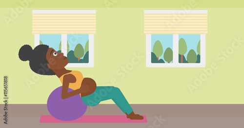 Pregnant woman on gymnastic ball.