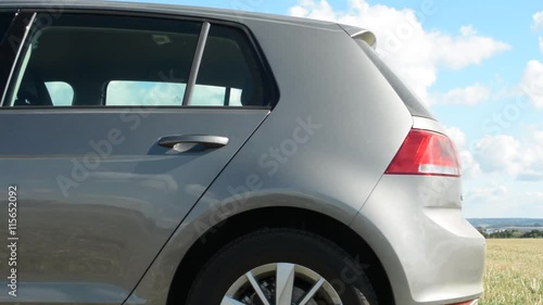 Wallpaper Mural back part of the car - car trunk - countryside field Torontodigital.ca