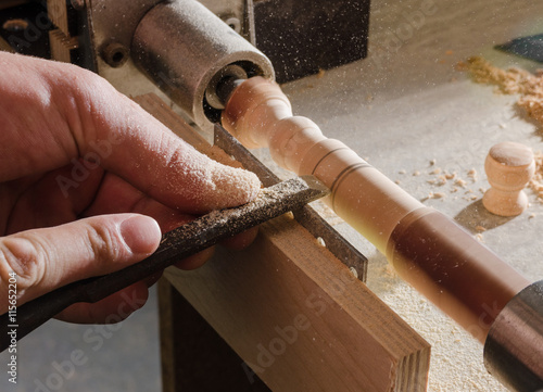 Carpenter working on the machine