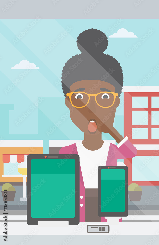 Woman looking at digital tablet and smartphone. Woman looking at digital tablet and smartphone.