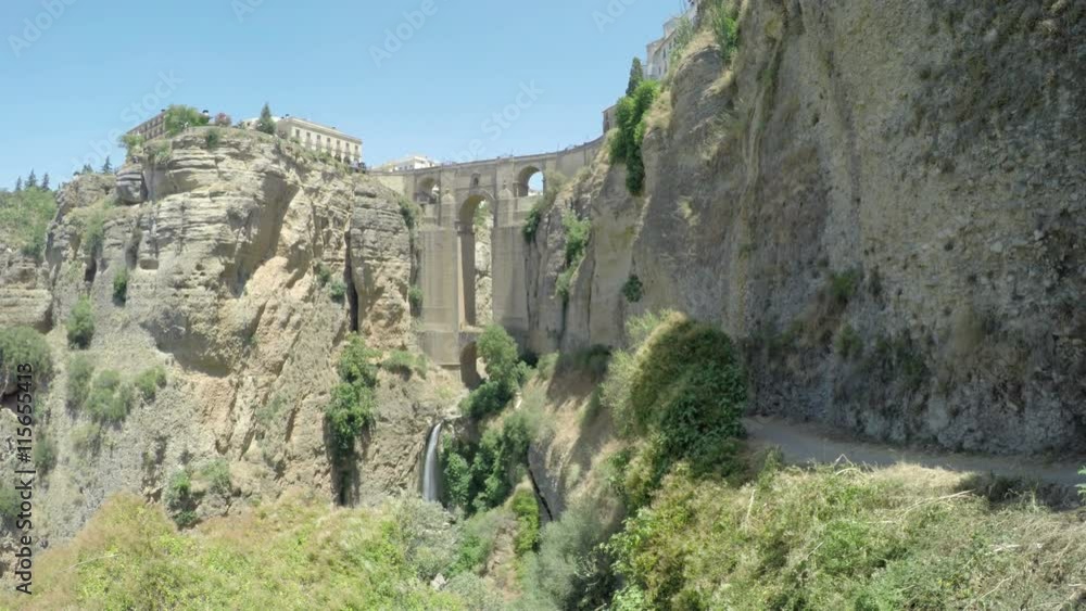 Rocky landscape and the Puente Nuevo (the New Bridge) in Ronda, Andalusia, Spain. Rocky landscape and the Puente Nuevo (the New Bridge) in Ronda, Andalusia, Spain.