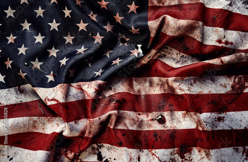 Grunge american flag background with blots of blood photo