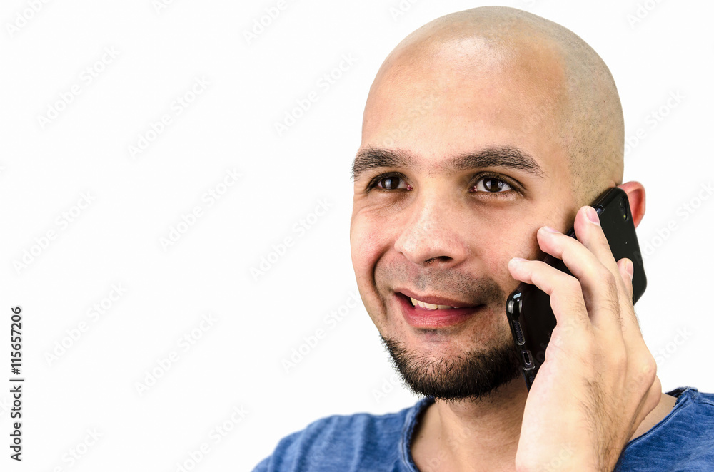 bald-headed man talking on a mobile phone bald-headed man talking on a mobile phone