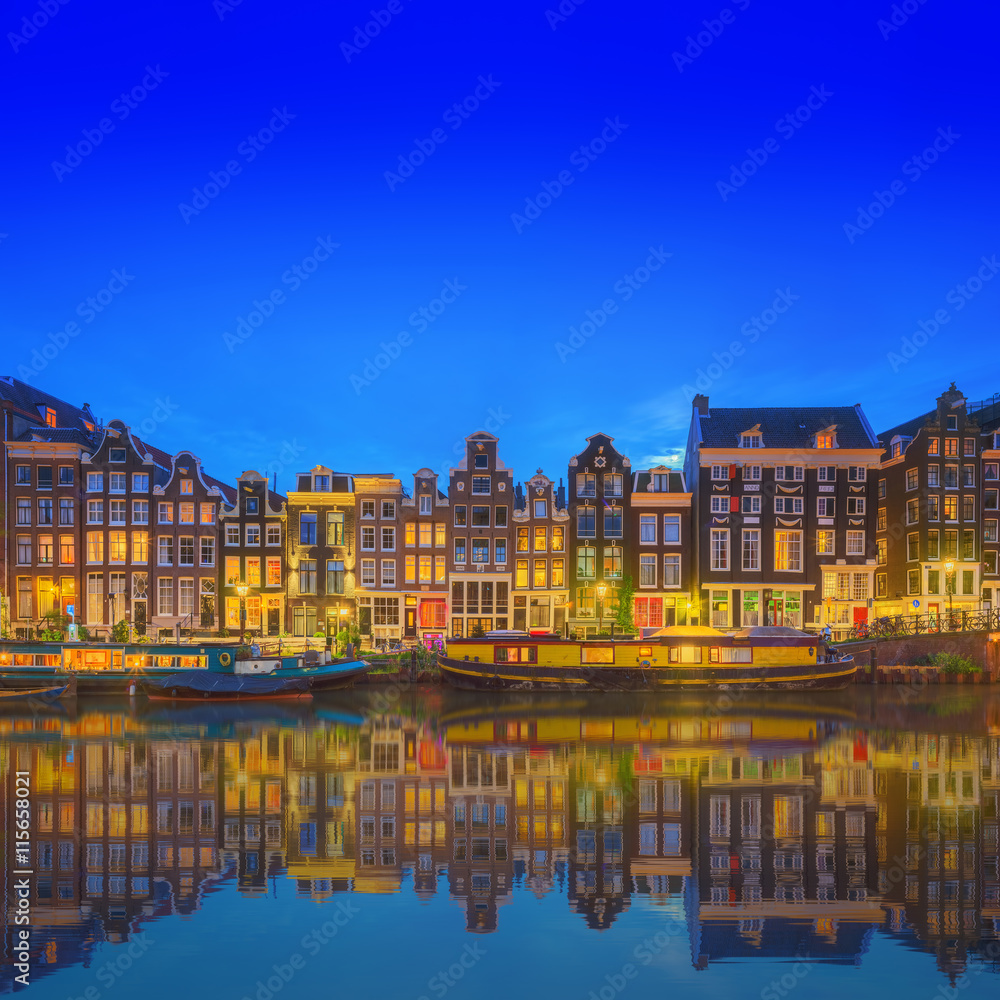 Amstel river, canals and night view of beautiful Amsterdam city. Netherlands Amstel river, canals and night view of beautiful Amsterdam city. Netherlands