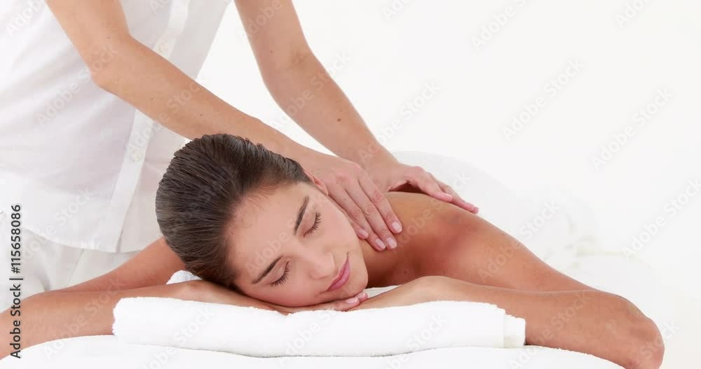 Woman enjoying a shoulder massage in high quality 4k format Woman enjoying a shoulder massage in high quality 4k format