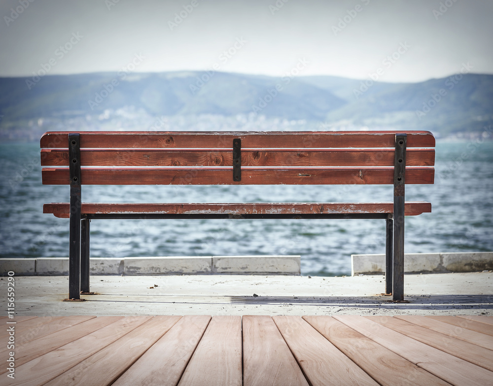 Empty bench and sea.