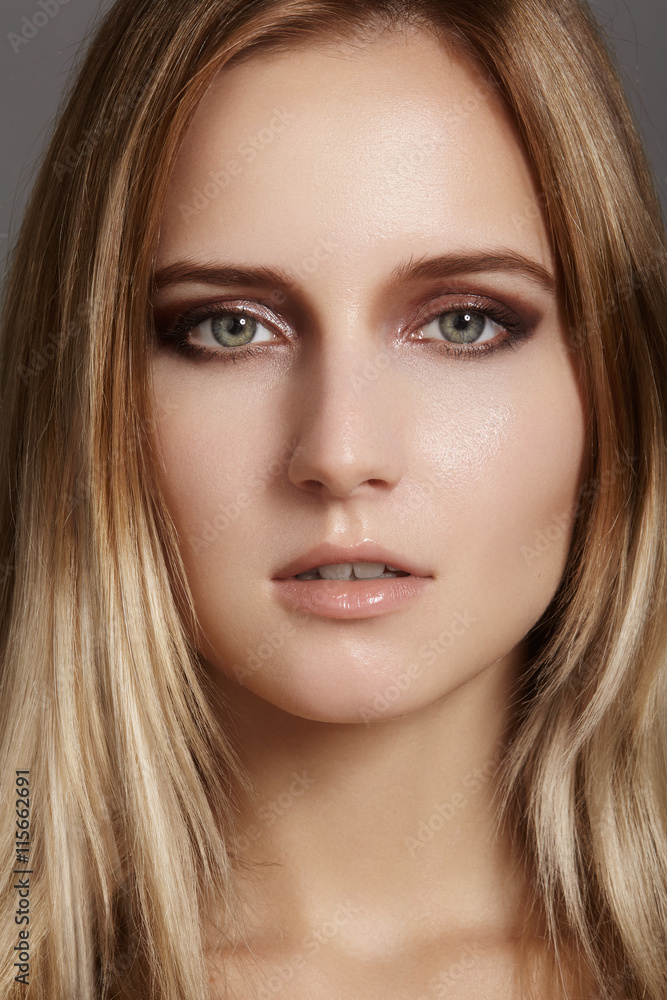 Beautiful young woman with gloss eyes and lips visage, dark blond color long hair. Beauty portrait with clean skin, glamour fashion makeup. Cosmetics, make up, hairstyle. Haircare
Beautiful young woman with gloss eyes and lips visage, dark blond color long hair. Beauty portrait with clean skin, glamour fashion makeup. Cosmetics, make up, hairstyle. Haircare
