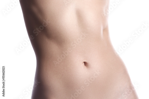 Beatiful body shapes. Slim waist, flat belly, soft clean skin. Perfect female body on white background. Sexy curves, sport form. Healthcare