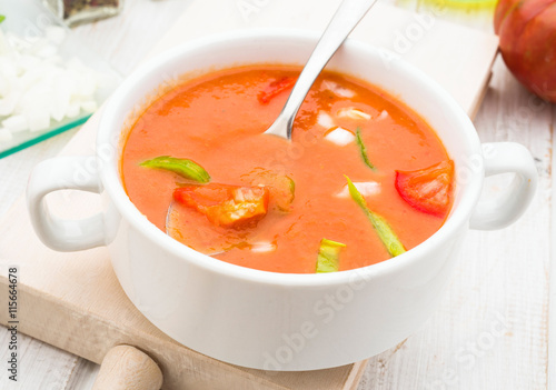 pieces of vegetable in Andalusian gazpacho in white bowl