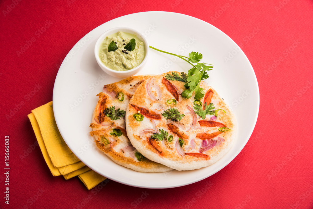 south indian food, two uttapam with coconut chutney in white ceramic