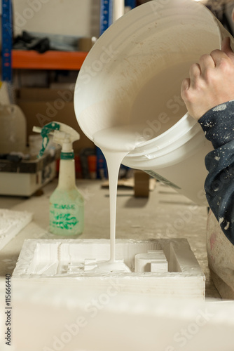 Liquid Plaster Poured Onto Open Mold