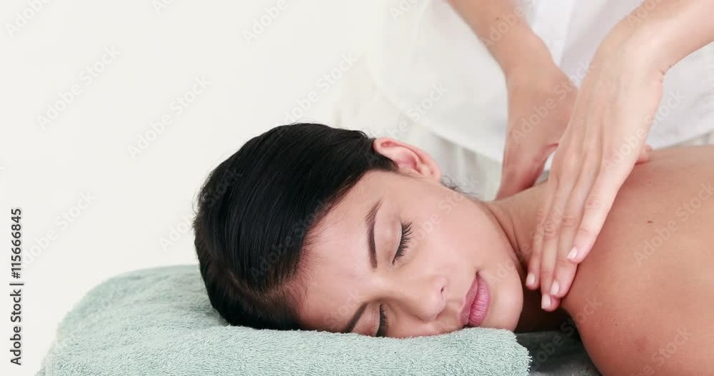 Woman enjoying a massage in high quality 4k format Woman enjoying a massage in high quality 4k format
