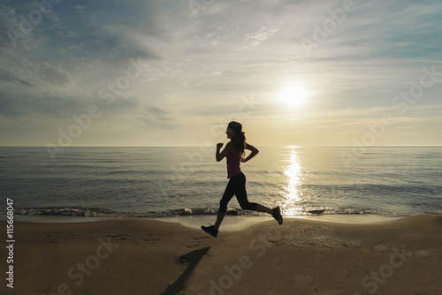 Woman Running on the Beach.