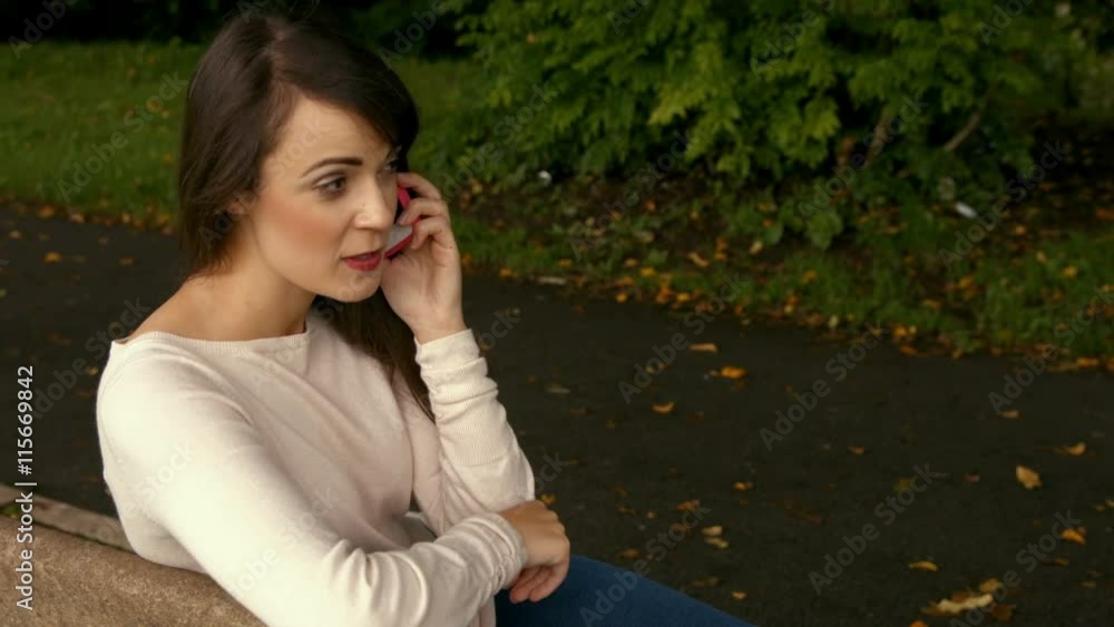 Pretty woman on a phone call outdoors Pretty woman on a phone call outdoors