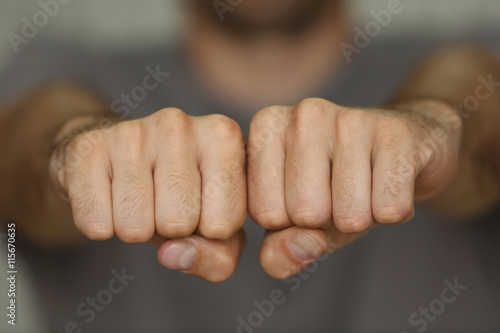 Man fists with space for tattoo photo