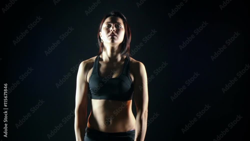beautiful woman training with dumbbells beautiful woman training with dumbbells