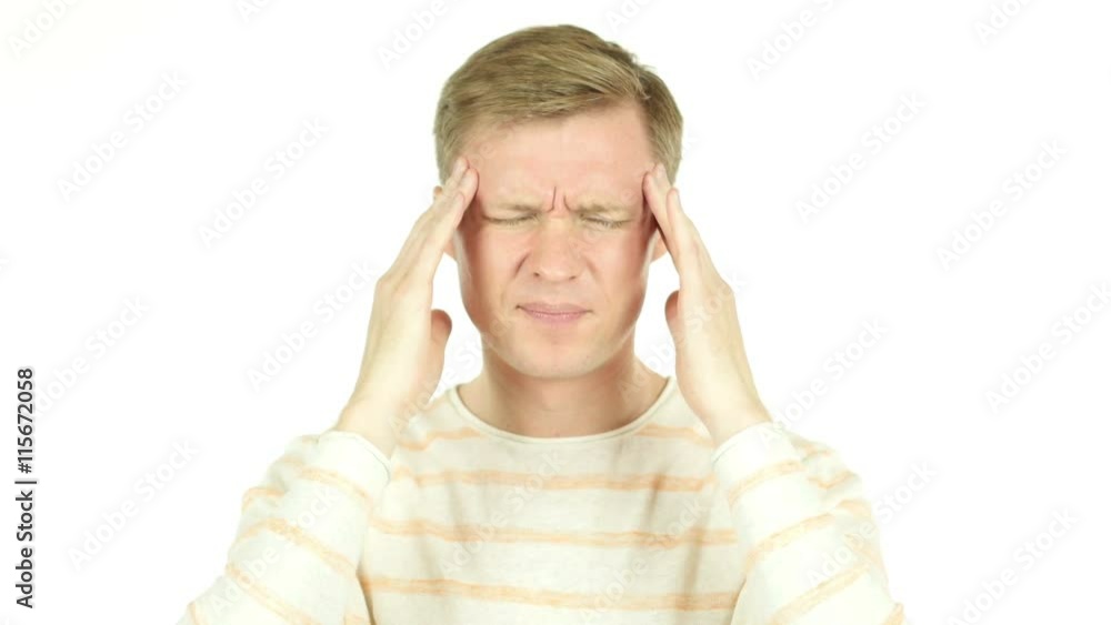 Young Man having a headache, Work Overload, Stress Young Man having a headache, Work Overload, Stress