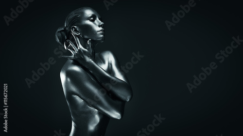 Lady in silver paint, icon pose