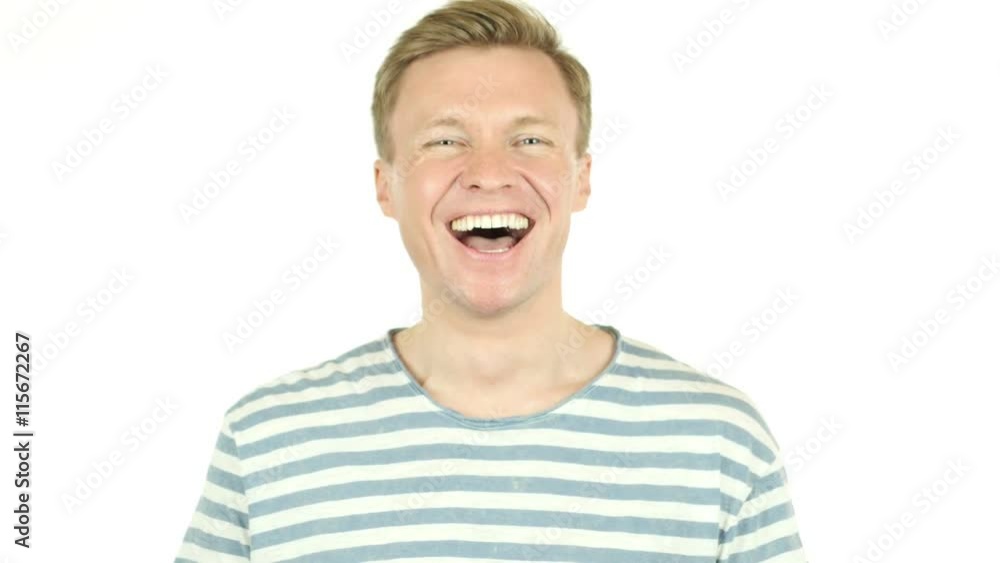 Closeup of handsome guy Laughing on Joke, Isolated on white background Closeup of handsome guy Laughing on Joke, Isolated on white background