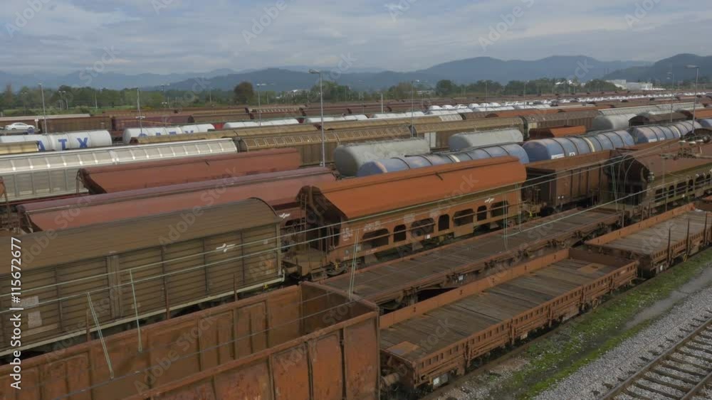 AERIAL: Freight trains on a railroad station AERIAL: Freight trains on a railroad station