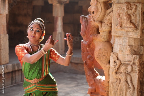 kuchipudi is one of the classical dance forms of india,belongs to state andhra pradesh.here the dancer poses before a temple