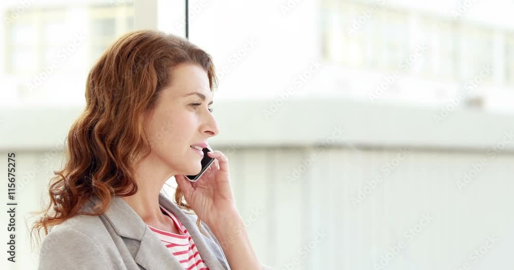 Smiling woman calling with her smartphone on white background Smiling woman calling with her smartphone on white background