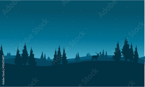 silhouette of snowing winter town