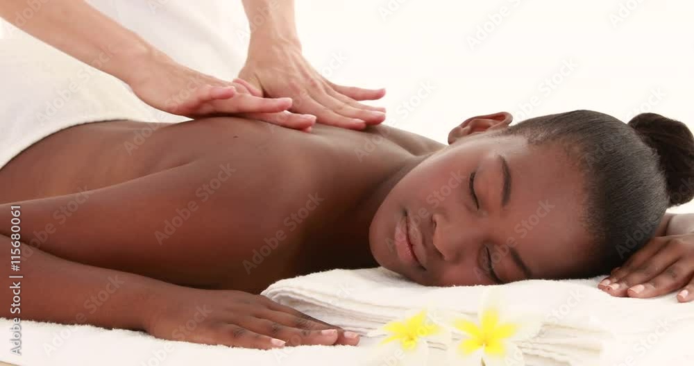 Woman enjoying a back massage in high quality 4k format Woman enjoying a back massage in high quality 4k format