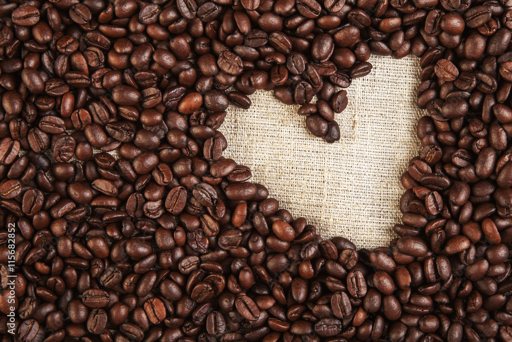 Plenty of coffee beans and texture heart shape background love s Plenty of coffee beans and texture heart shape background love s