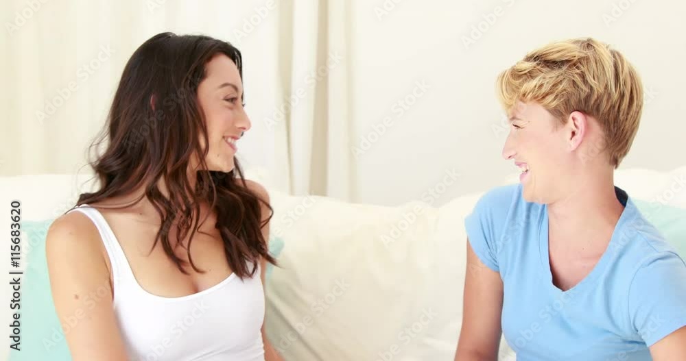 Lesbian couple exchanging a gift in high quality 4k format Lesbian couple exchanging a gift in high quality 4k format