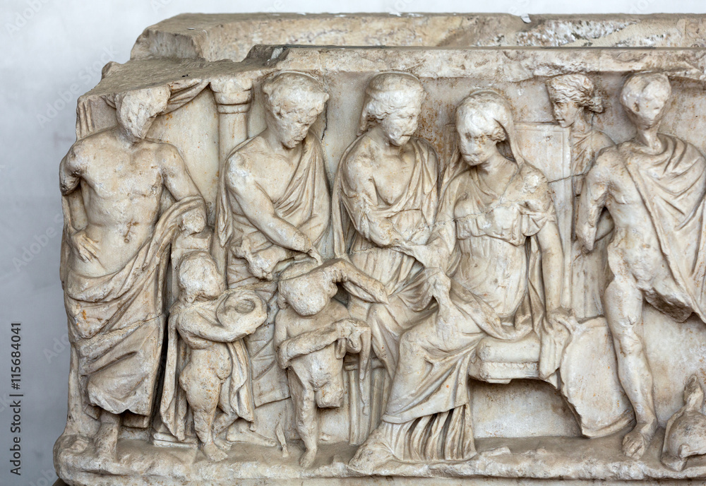  Relief on the ancient sarcophagus in the baths of Diocletian in Rome. Italy
