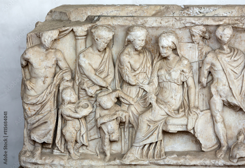 Relief on the ancient sarcophagus in the baths of Diocletian in Rome. Italy Relief on the ancient sarcophagus in the baths of Diocletian in Rome. Italy