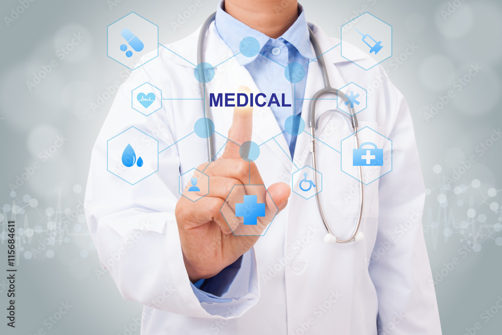 Doctor hand touching MEDICAL sign on virtual screen. medical concept Doctor hand touching MEDICAL sign on virtual screen. medical concept
