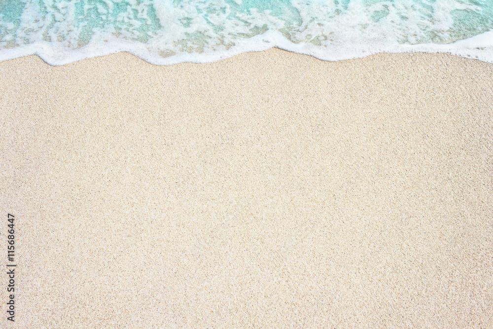 Soft ocean wave on the sandy beach, background. - obrazy, fototapety, plakaty 