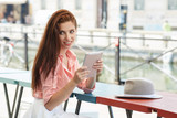 beautiful woman using tablet on lunch break in the cafe