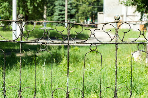 Принти на полотні Fence made of rusty metal rods. Very old and rusty. The backgrou