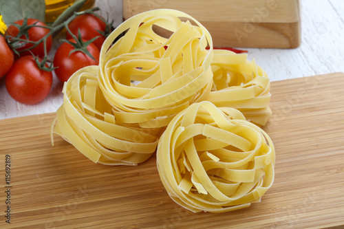 Raw fettuccine pasta