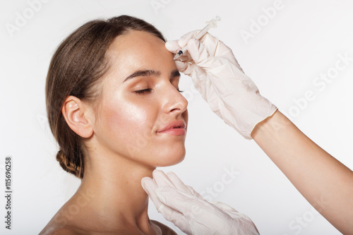 Girl getting beauty antiage injection for face