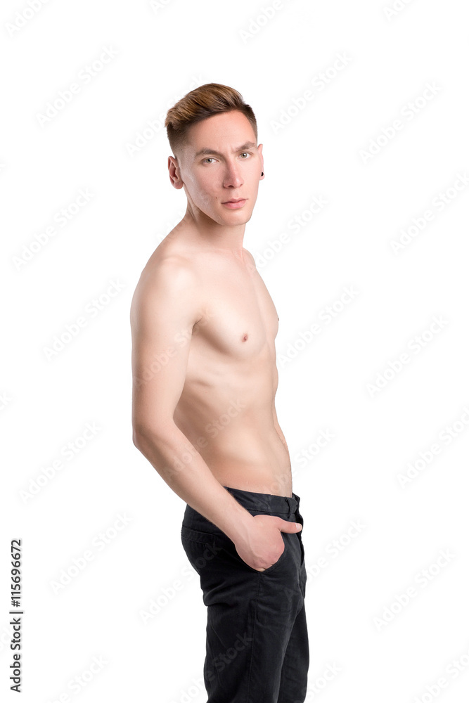 young naked man in pants isolated on white background young naked man in pants isolated on white background