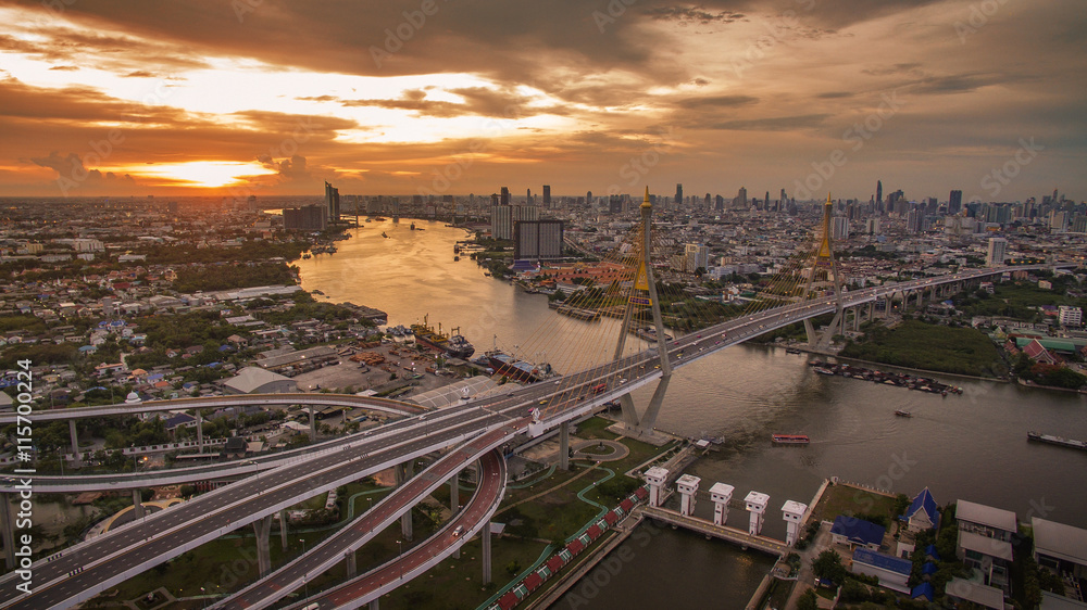 Fototapeta premium aerial view of bhumiphol bridge crossing chaopraya river importa